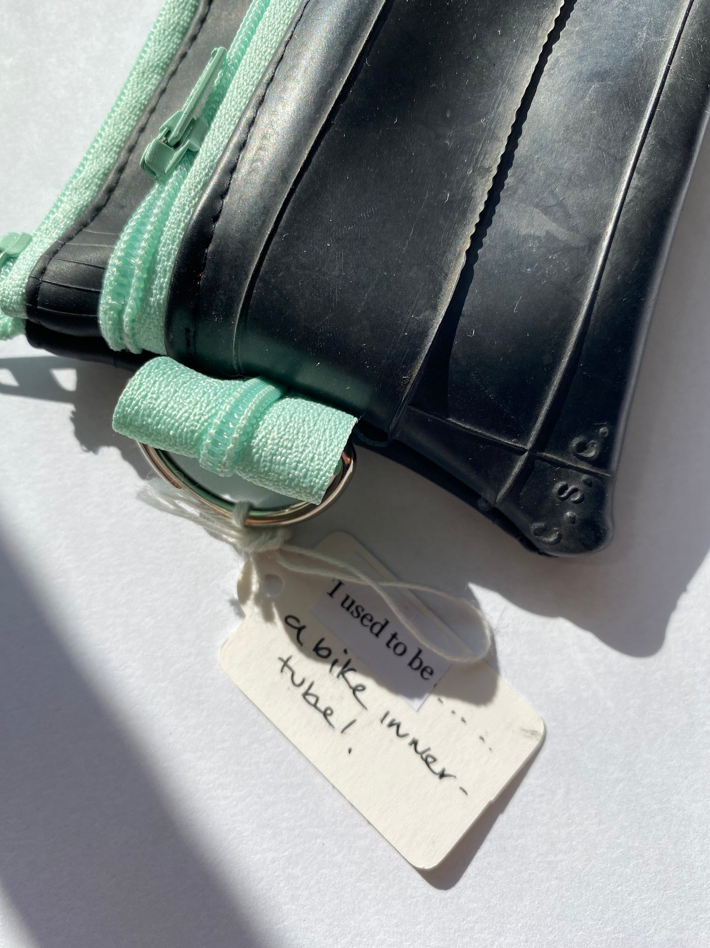 Small zipper pouch Light Blue recycled bicycle inner tube by Re-Inflatables