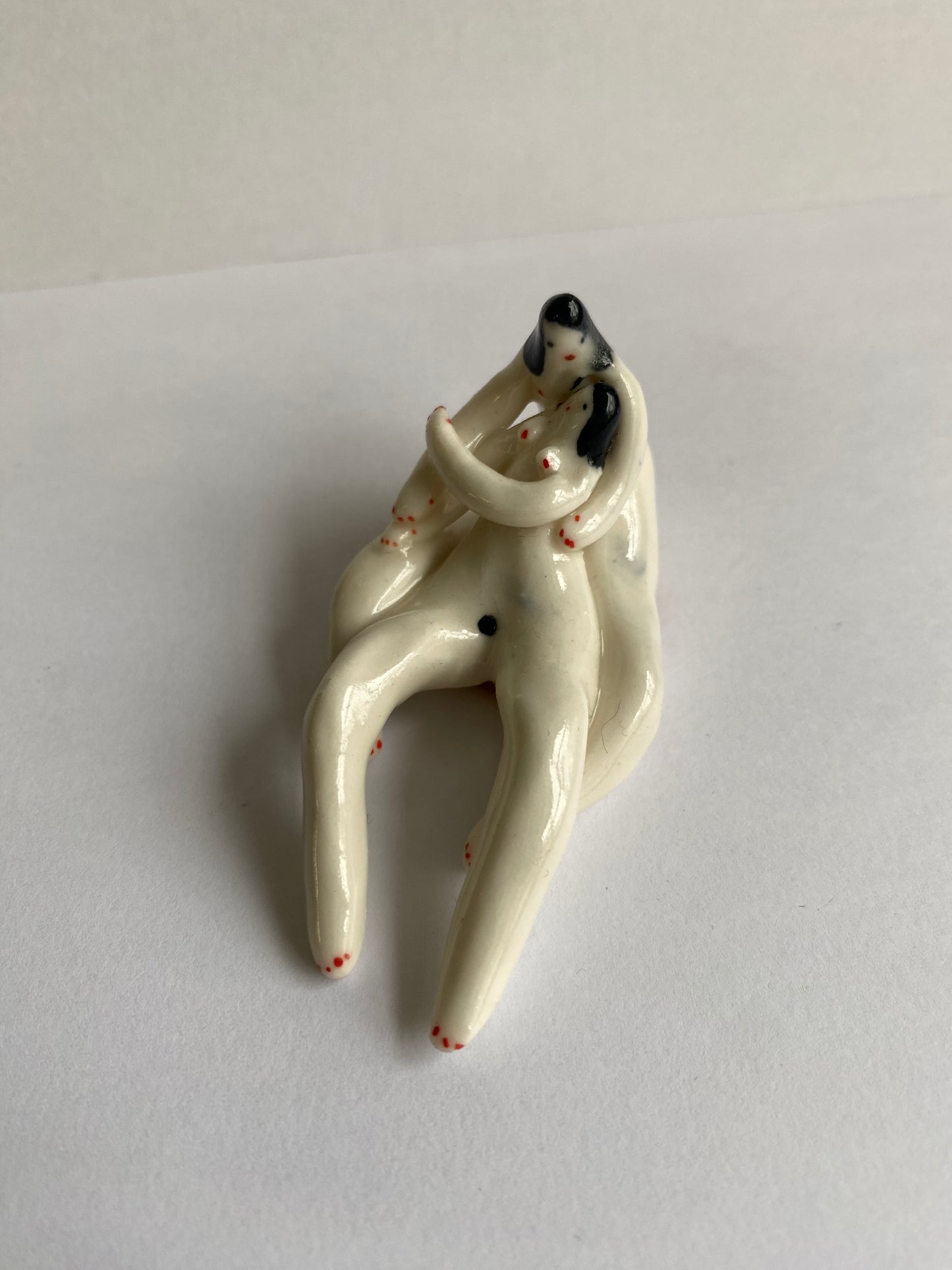 Porcelaine tiny ladies hug by Rebecca Edelmann Ceramics