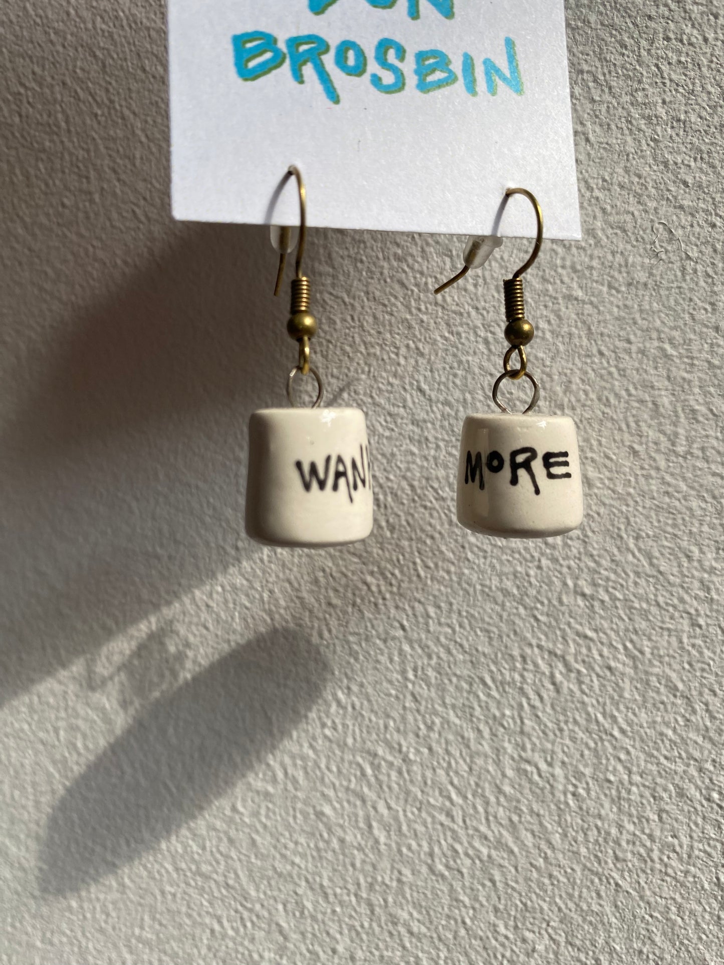 Wank More handmade ceramic earrings by Don Brosbin