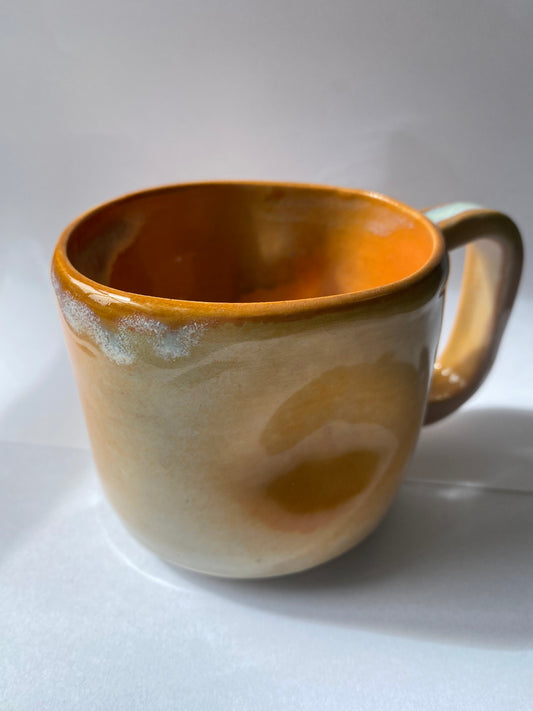 Orange Ceramic mug by Victoria Loyola
