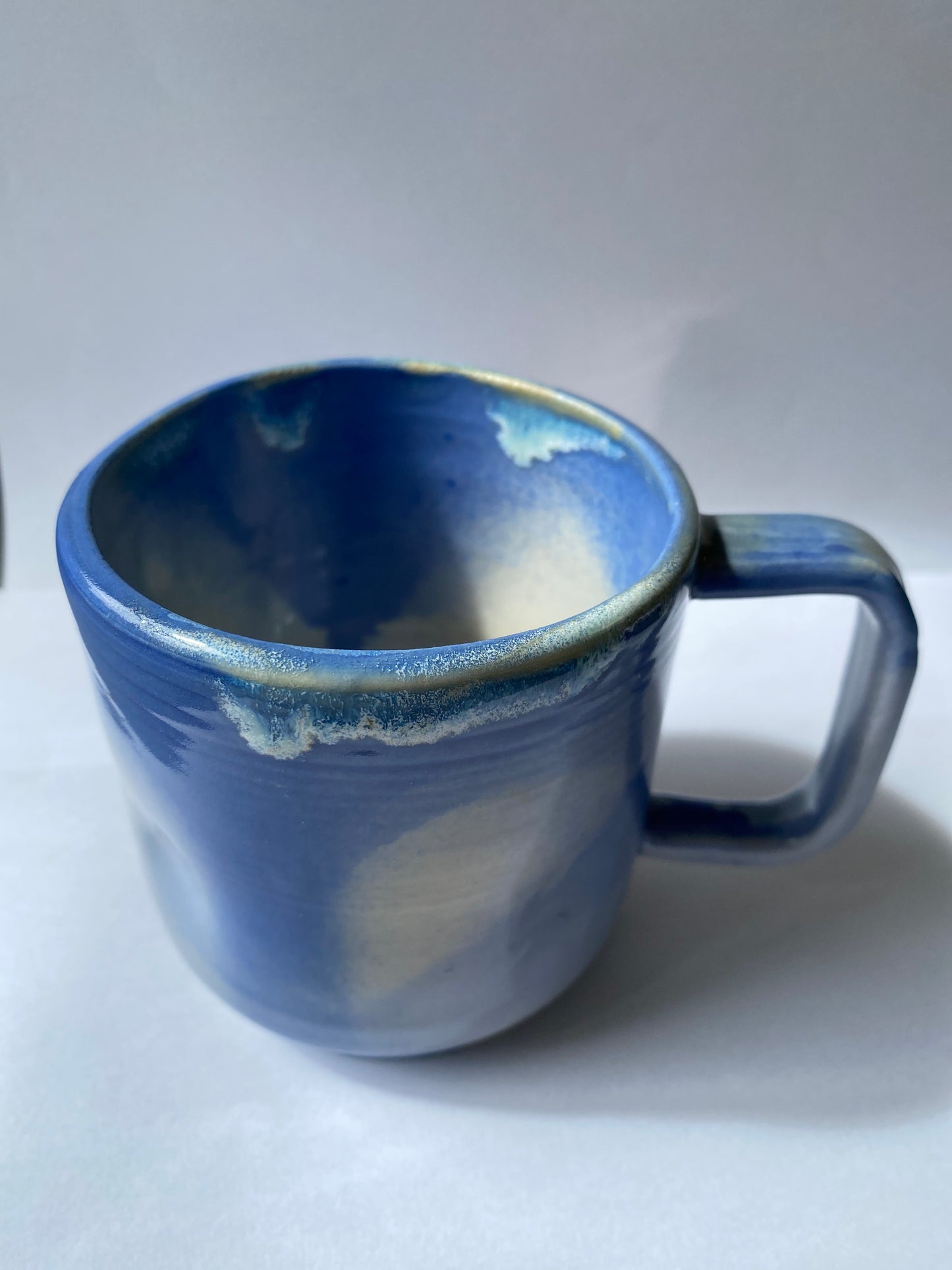 Blue Ceramic mug by by Victoria Loyola