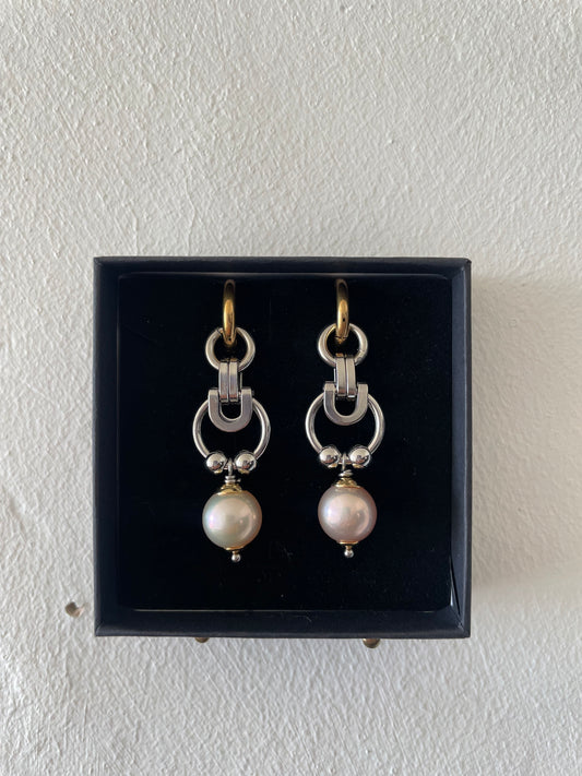 Stainless steel earrings with repurposed pearls by Eloy Santos
