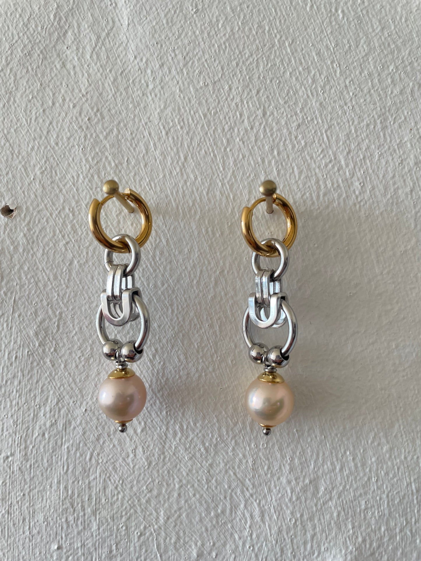 Stainless steel earrings with repurposed pearls by Eloy Santos