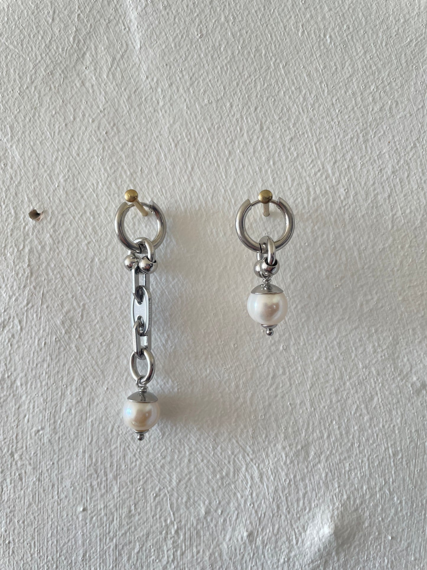 mixmatched repurposed stainless steel hardware earrings by Eloy Santos