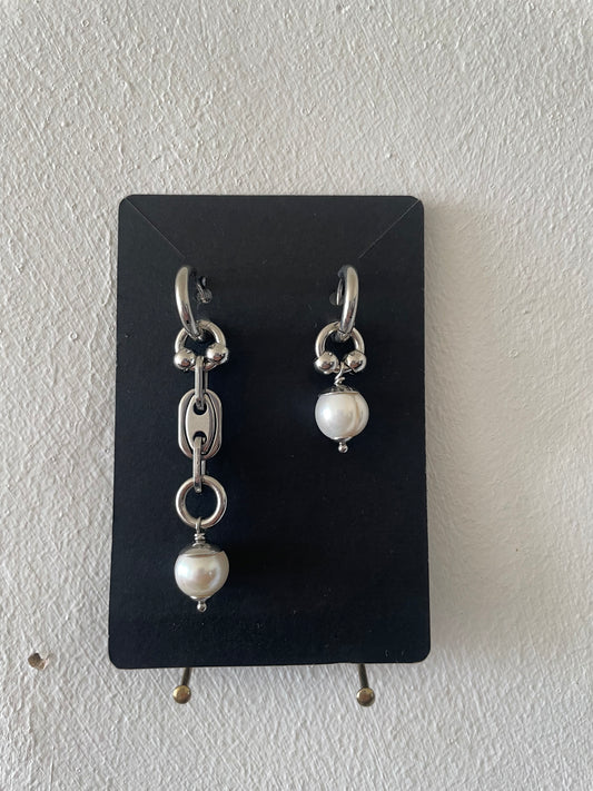 mixmatched repurposed stainless steel hardware earrings by Eloy Santos