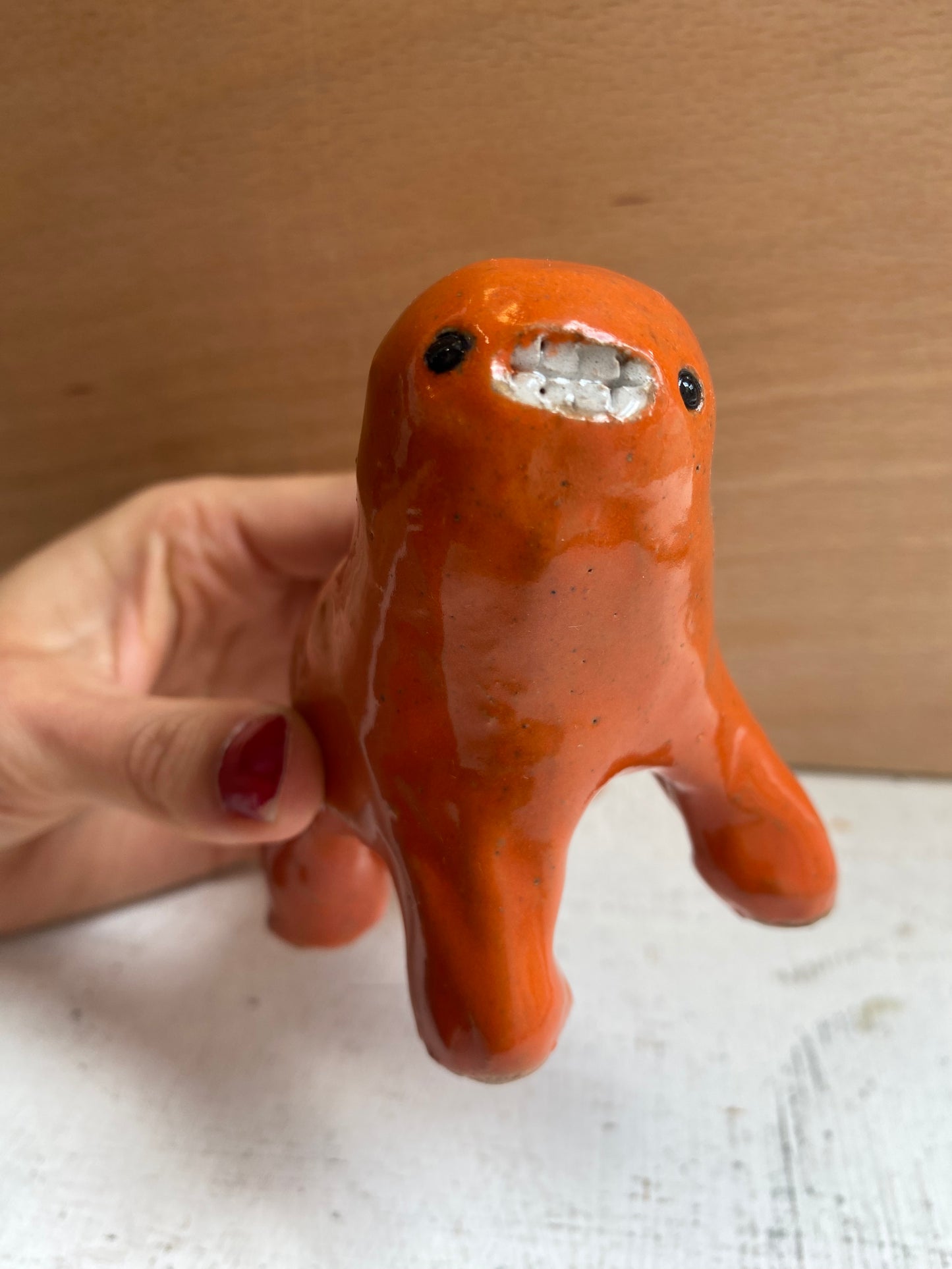 Orange Ceramic Teethie by Rebecca Edelmann ceramics