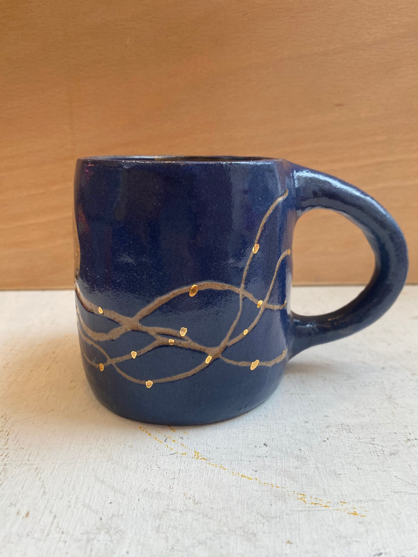 Octopus with real gold detail ceramic stoneware navy blue mug by REBECCA EDELMANN Ceramics