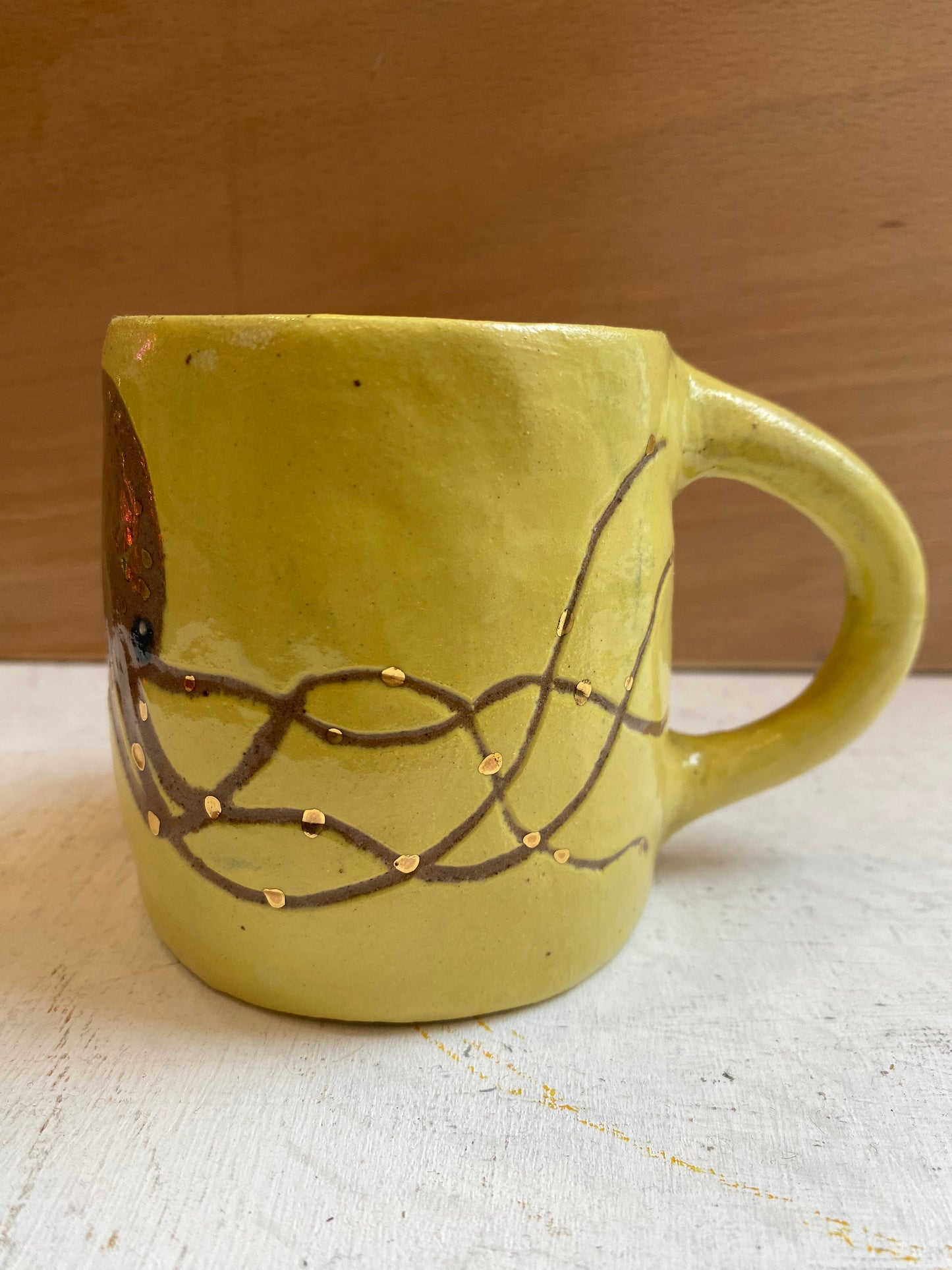 Octopus with real gold detail ceramic stoneware Yellow mug by REBECCA EDELMANN Ceramics