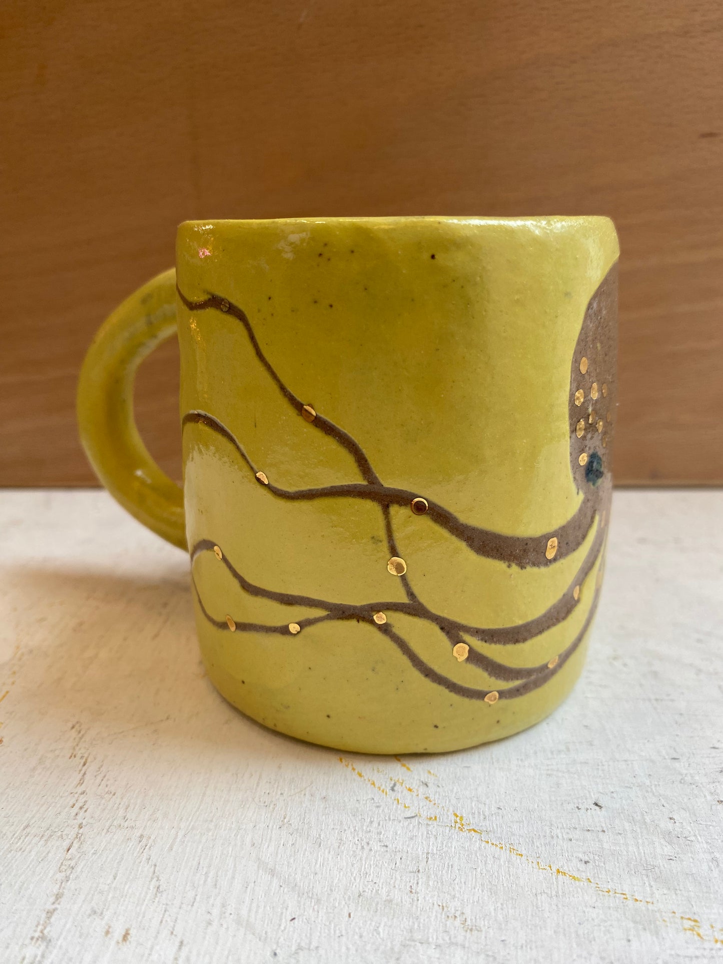 Octopus with real gold detail ceramic stoneware Yellow mug by REBECCA EDELMANN Ceramics