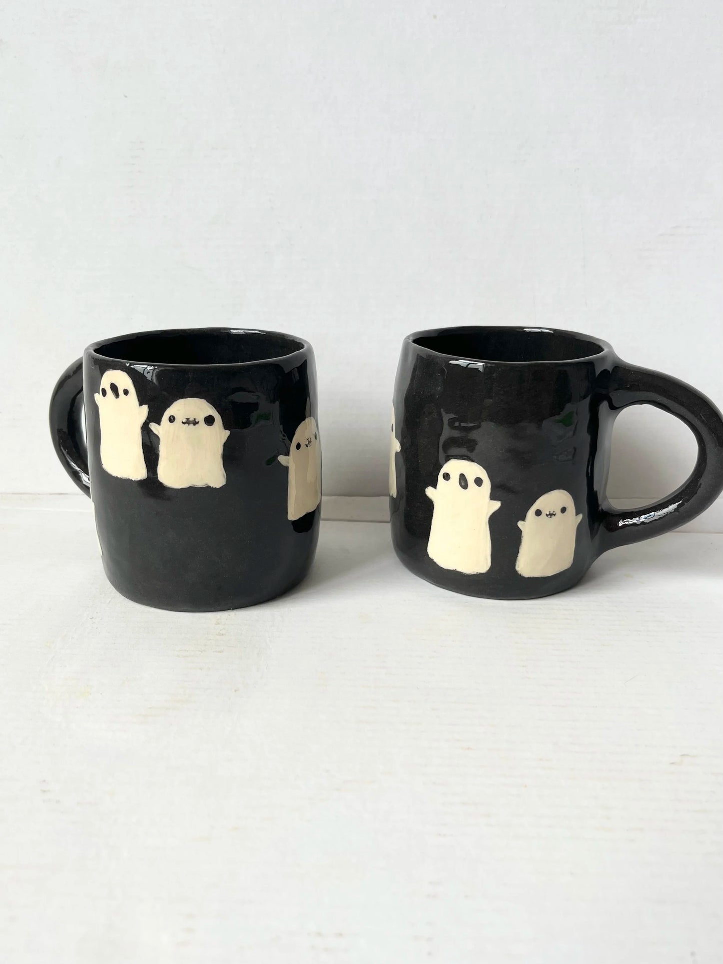 Handmade black and white ghost mug by REBECCA EDELMANN Ceramics
