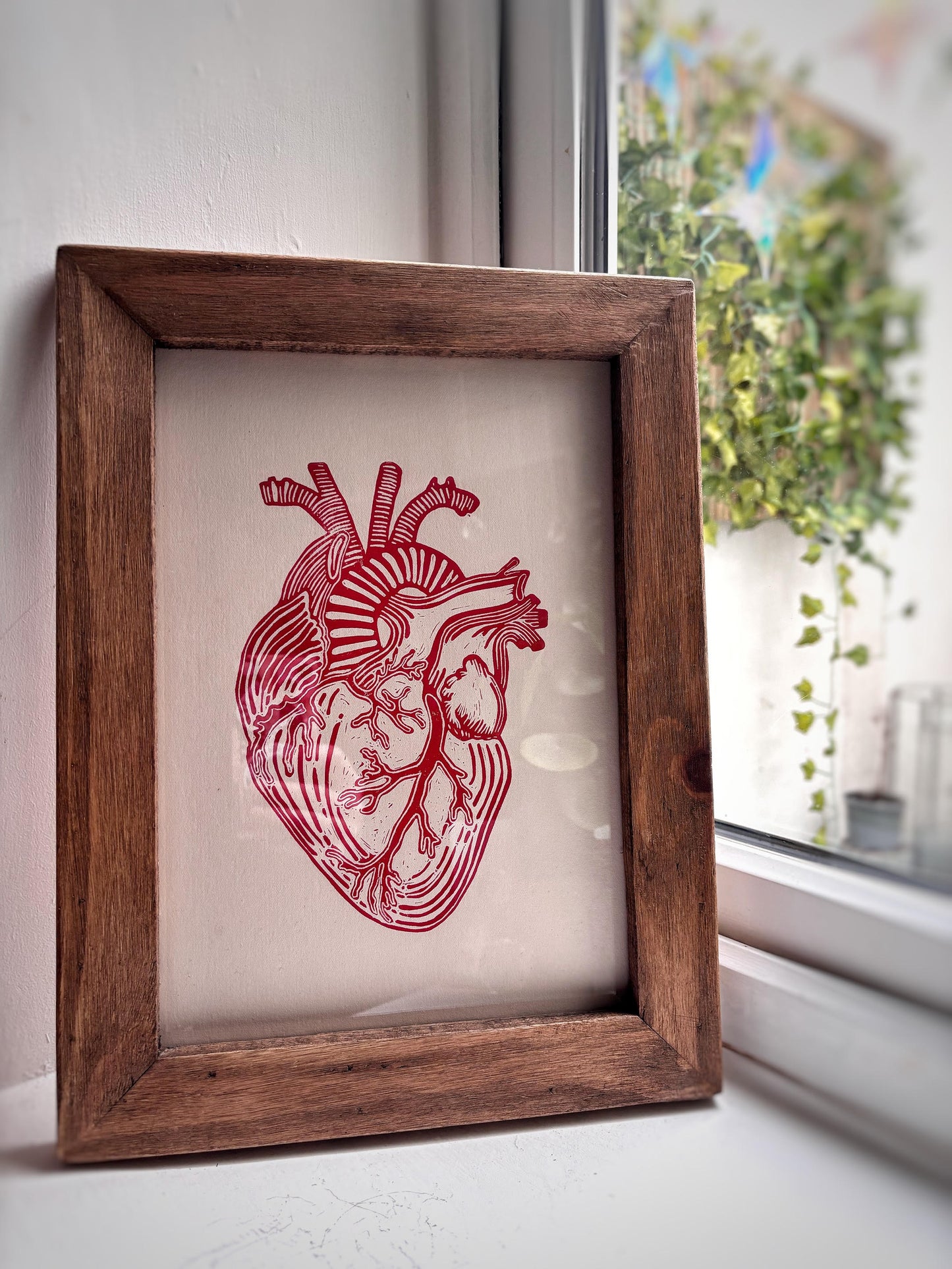 Human heart lino print by Gleeful Hive