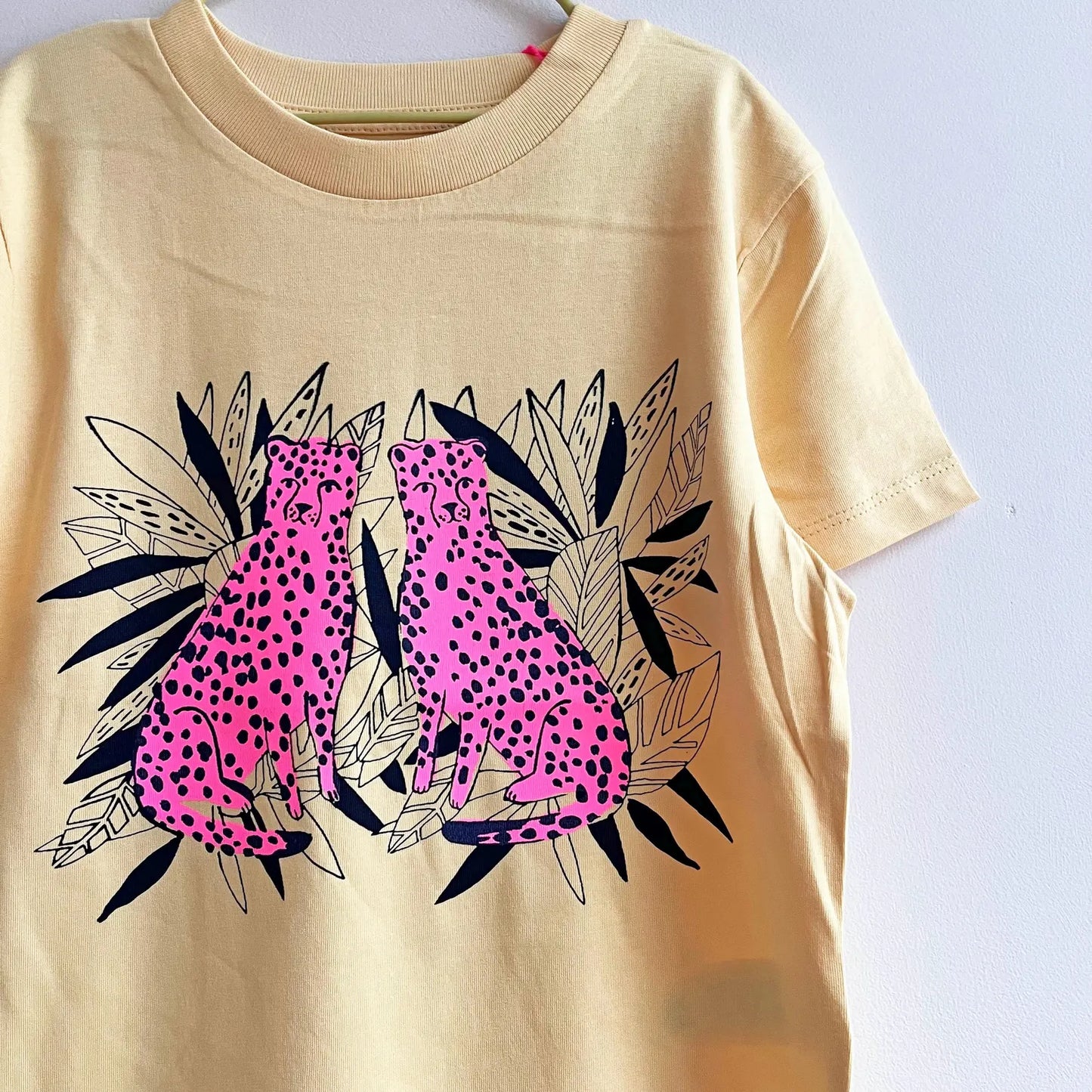 Pale yellow Tshirt with pink twin leopards in leaves Kids Tee by Pinkijones