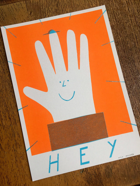 Hey Hand with a little face and cap riso print by Maxy Machen