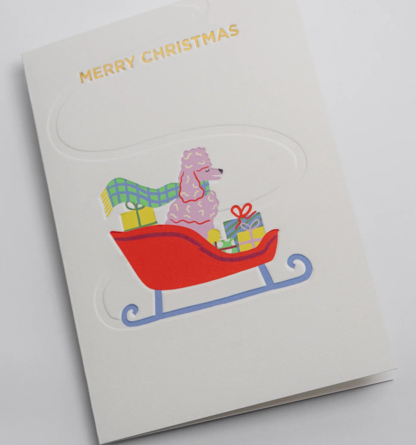Poodle Sleigh Graphic Christmas Card by Naomi Wilkinson