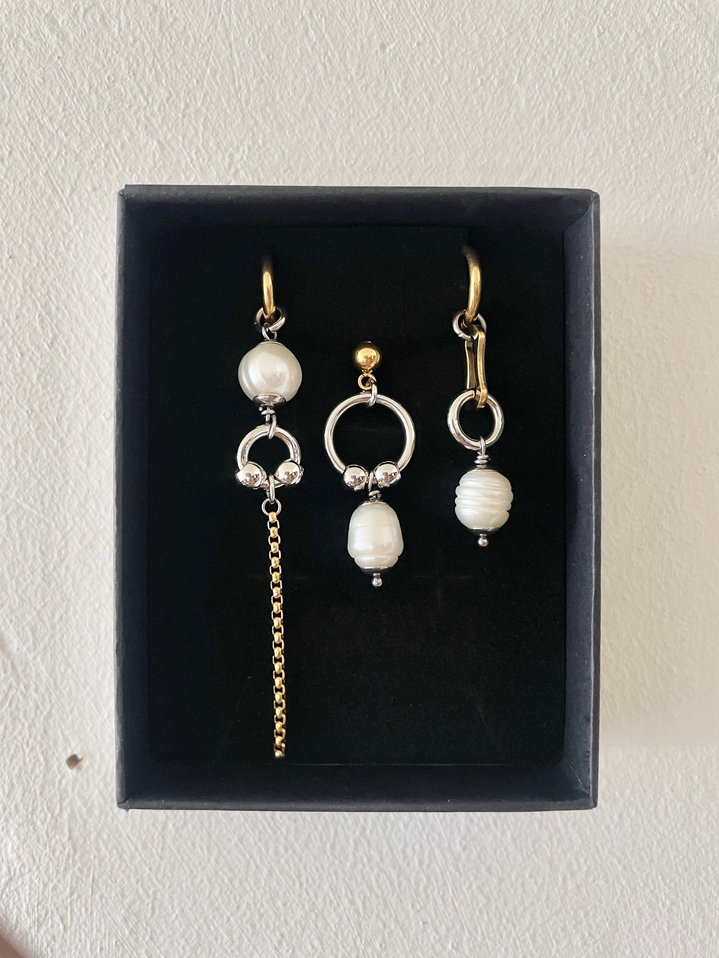 Mixmatched Santa Perla earrings  by Eloy Sant