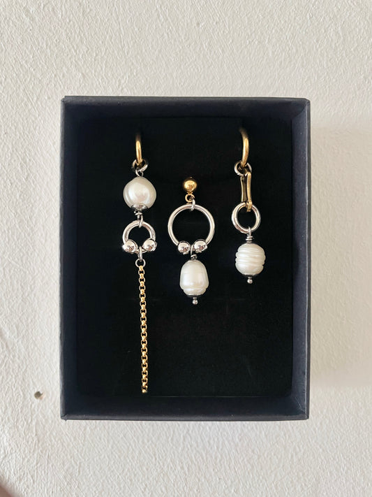 Mixmatched Santa Perla earrings  by Eloy Sant