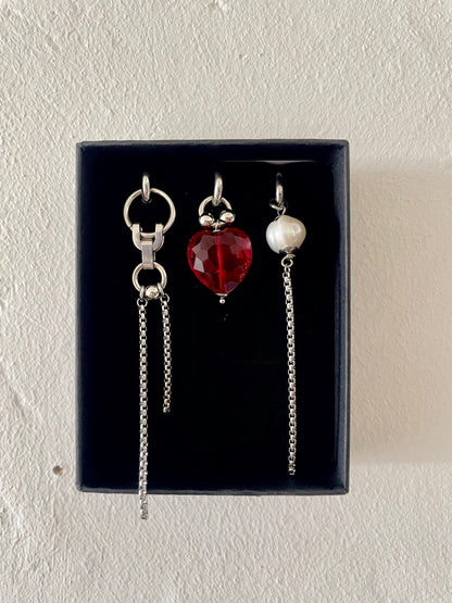 Mixmatched Santa Puso earrings  by Eloy Sant