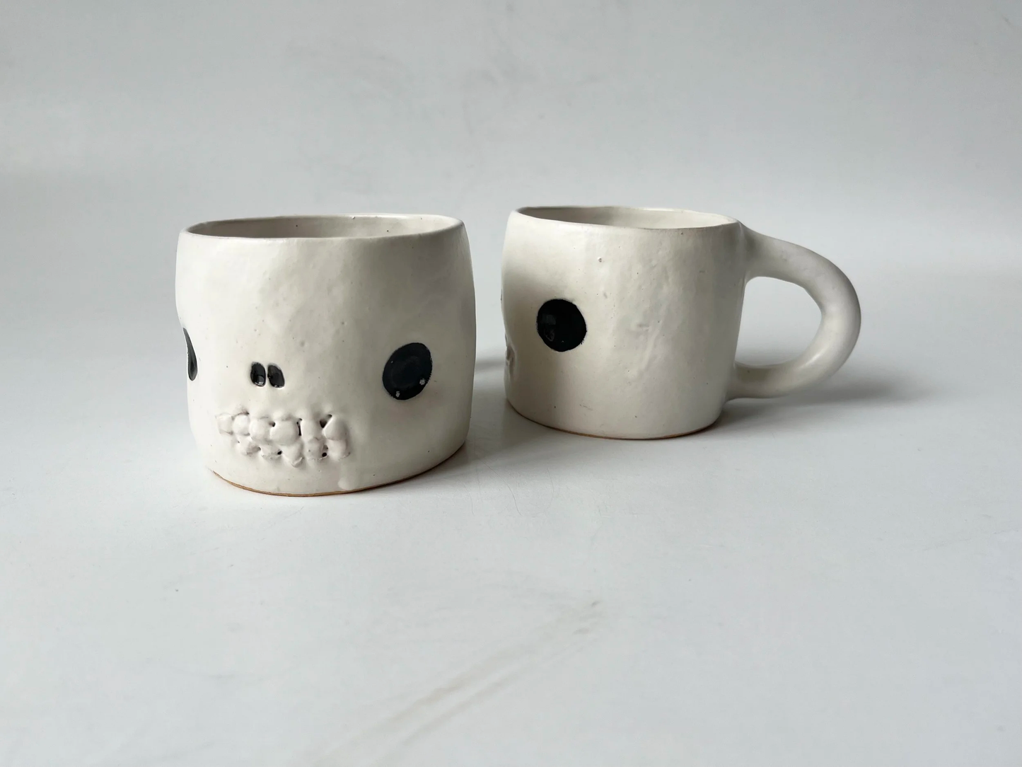 Handmade stoneware cup, in the shape of a skull mug by REBECCA EDELMANN Ceramics