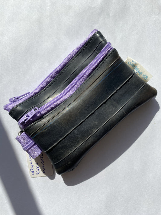 Small purple zipper pouch recycled bicycle inner tube by Re-Inflatables