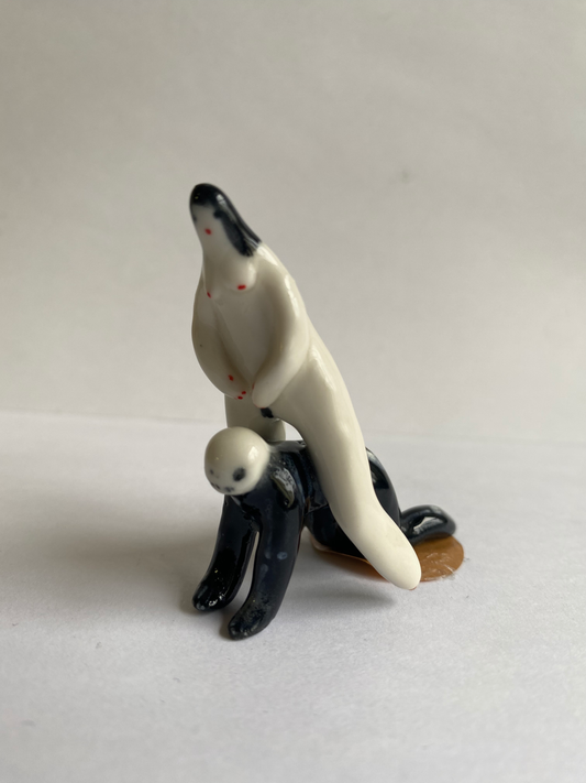 Porcelaine tiny lady and skeleton by Rebecca Edelmann Ceramics
