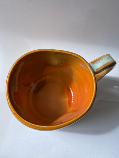Orange Ceramic mug by Victoria Loyola