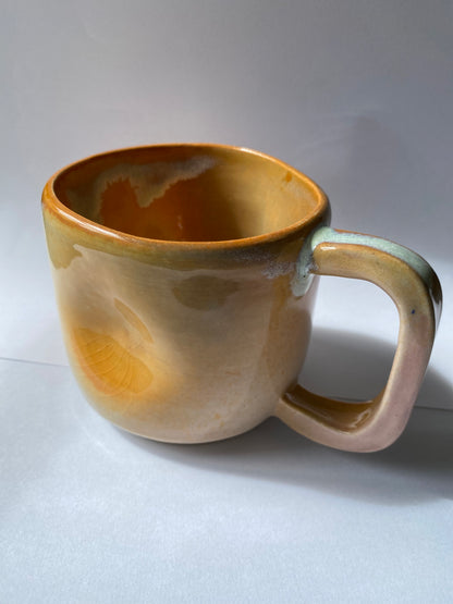 Orange Ceramic mug by Victoria Loyola