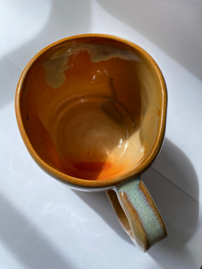 Orange Ceramic mug by Victoria Loyola