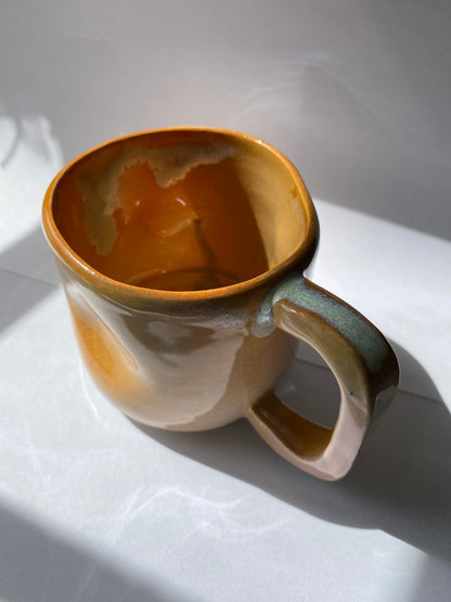 Orange Ceramic mug by Victoria Loyola