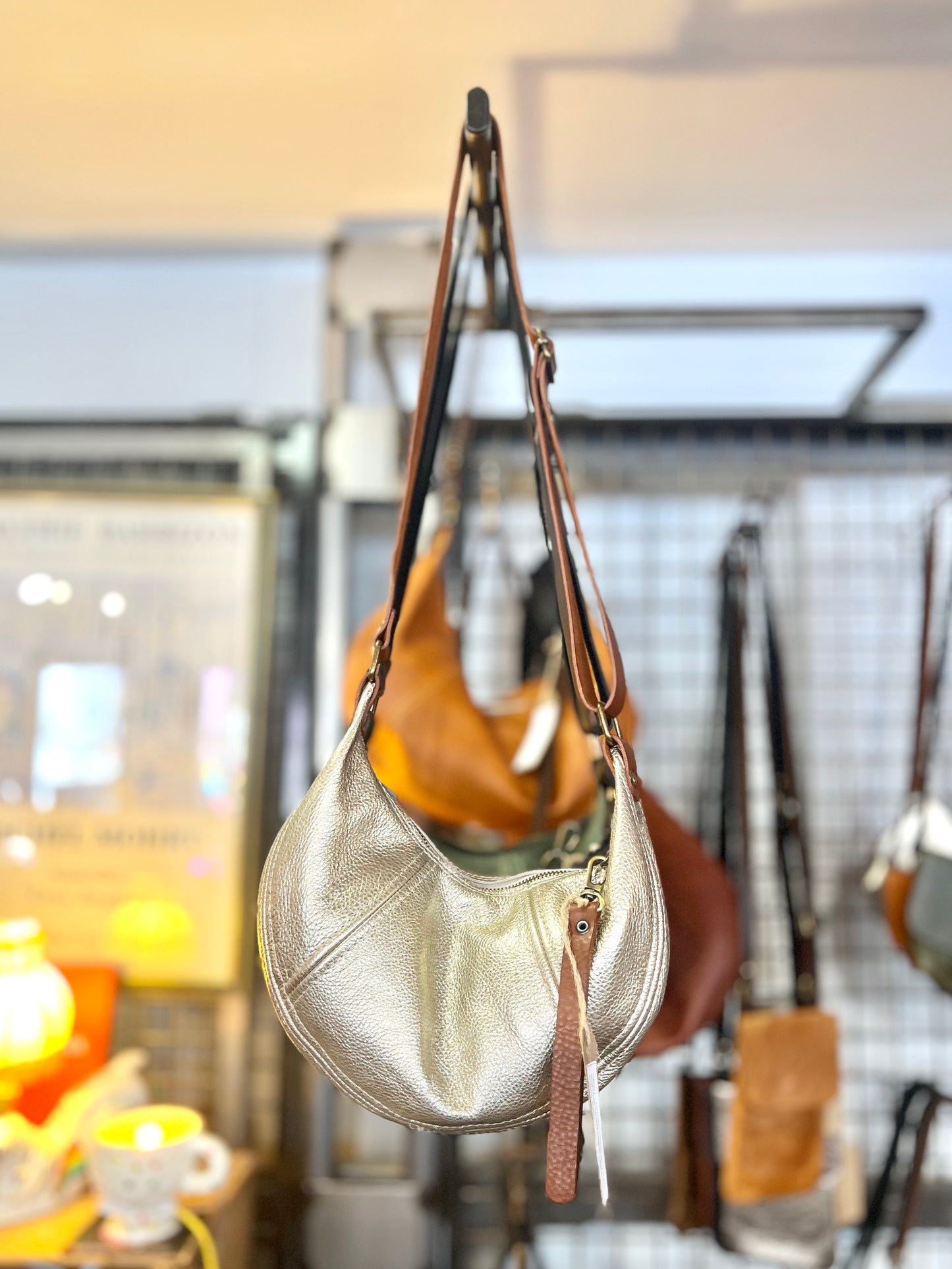 Small Leather Crescent Bag With Adjustable Strap and Zip by Scarlett Sky