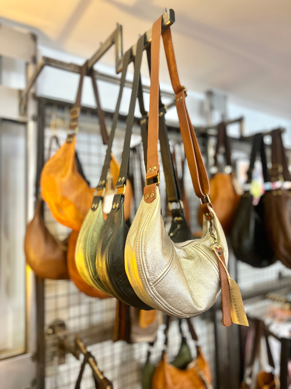 Small Leather Crescent Bag With Adjustable Strap and Zip by Scarlett Sky