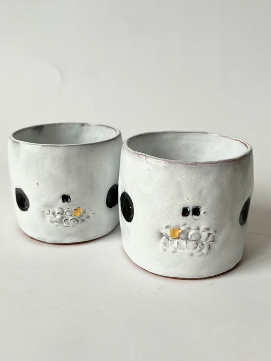 Handmade earthenware skull gold tooth plant pot by REBECCA EDELMANN Ceramics