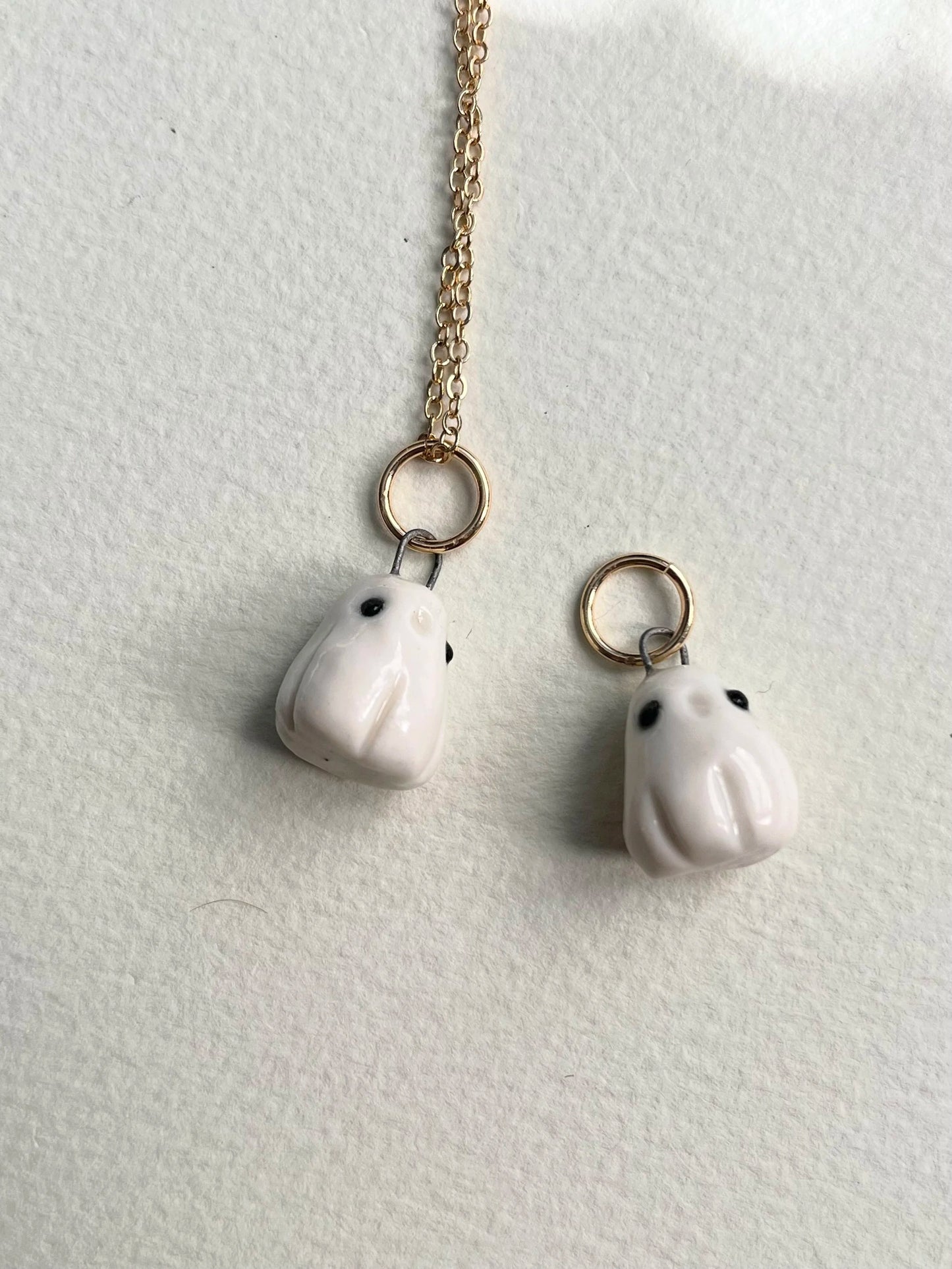 Porcelain Ghost Pendant With Gold Rim By REBECCA EDELMANN