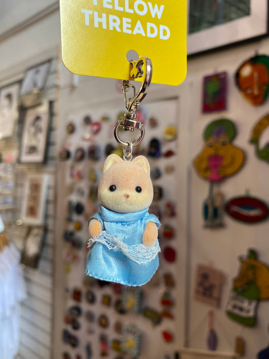 Baby Sylvanian in dress keyring by Yellow Threadd