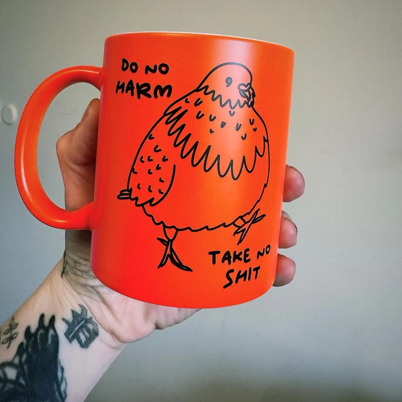 Do No Harm Orange Pigeon Mug by Daze Made