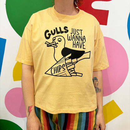 GULLS JUST WANNA HAVE CHIPS Yellow T-shirt by Hello Dodo