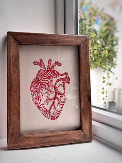 Human heart lino print by Gleeful Hive