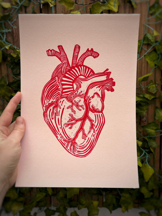 Human heart lino print by Gleeful Hive