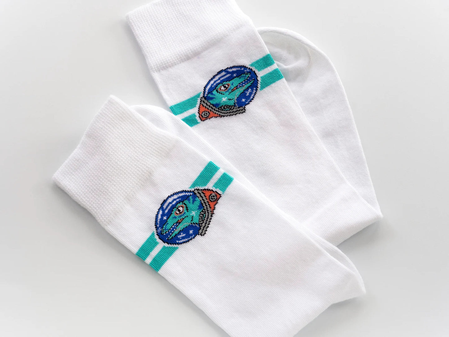 Space astronaut dinosaur white socks by Designosaur