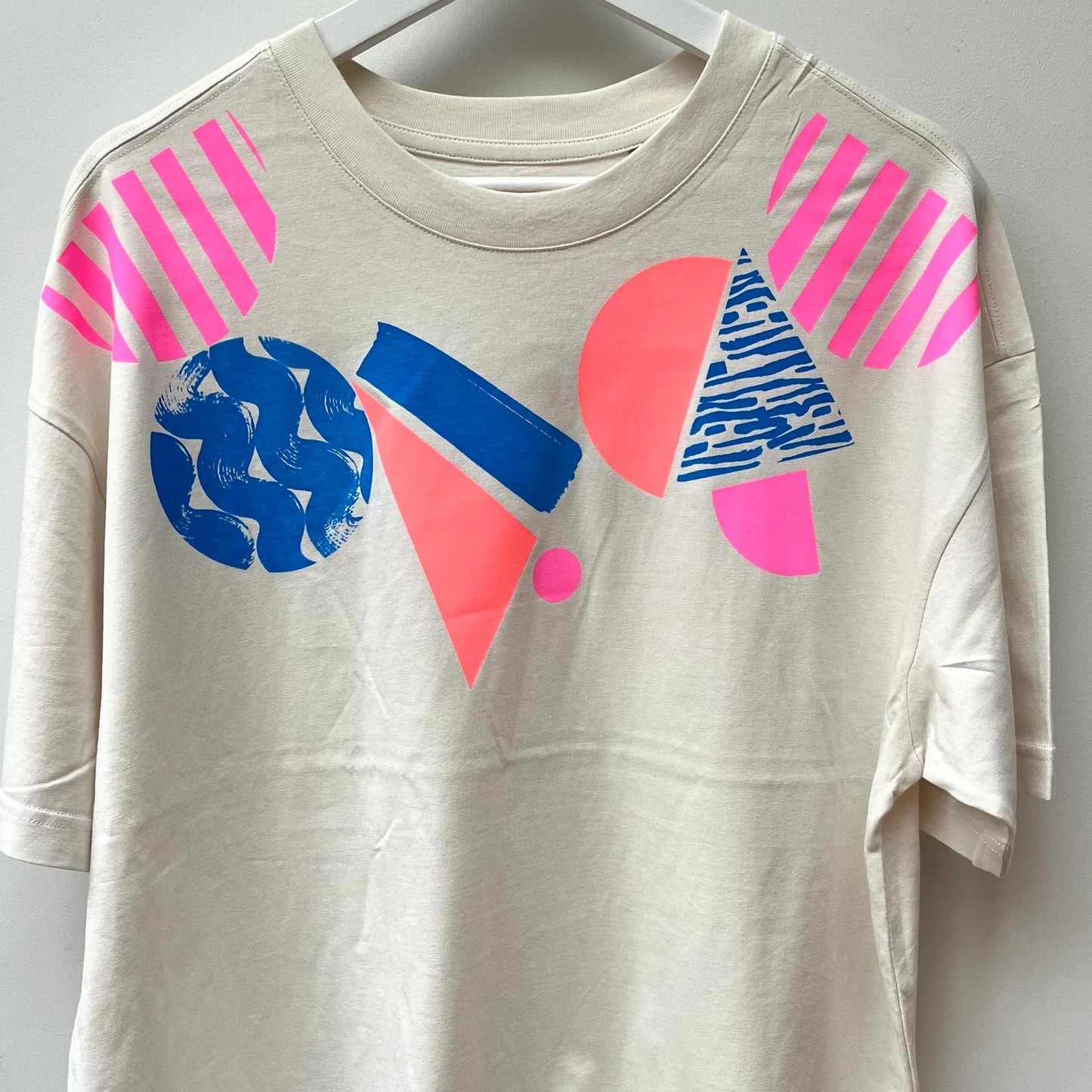 Geometric pattern Neon Pink coral and blue women's screenprinted White T-shirt by Pinkijones