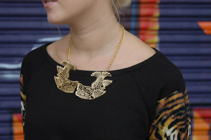 Japanese dolphin Kinshachi statement necklace by Designosaur