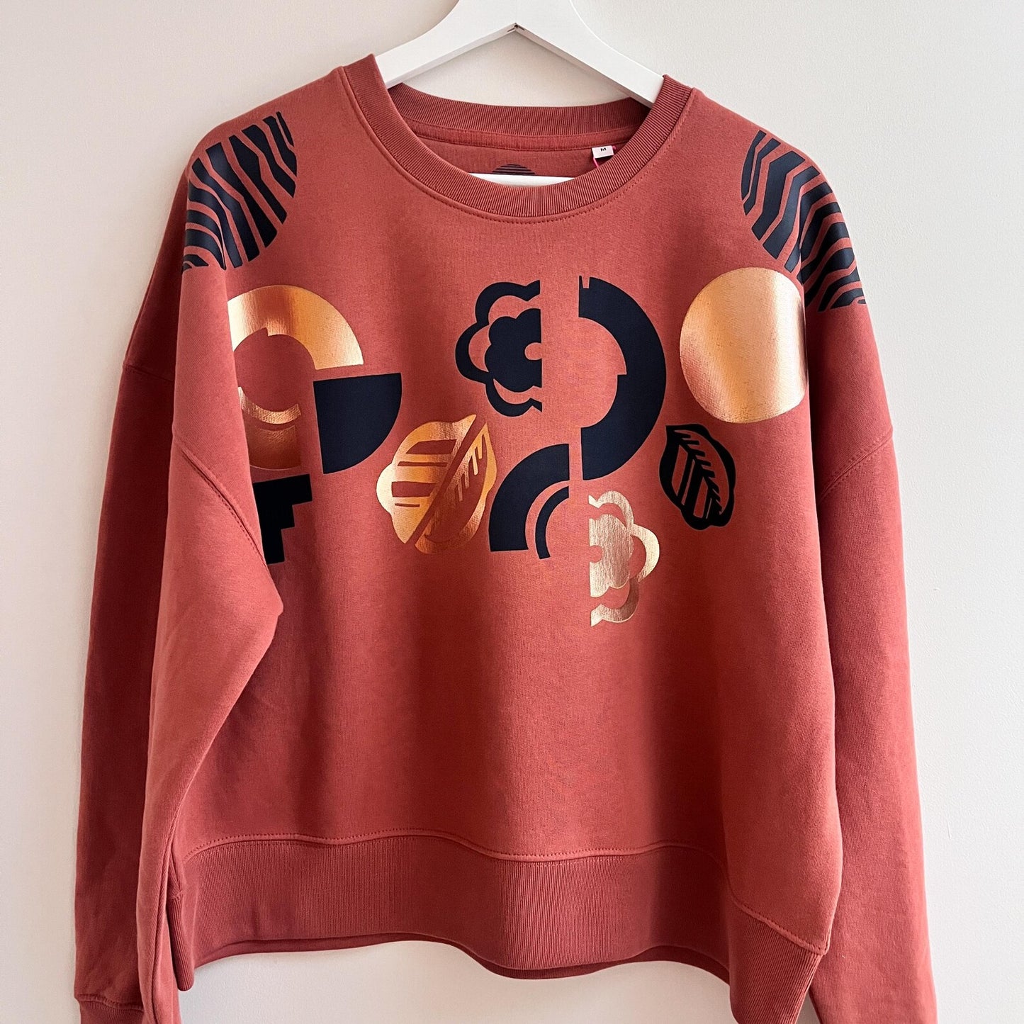 Geometric And Floral Pattern Hand Printed Terracotta Sweatshirt by Pinki Jones