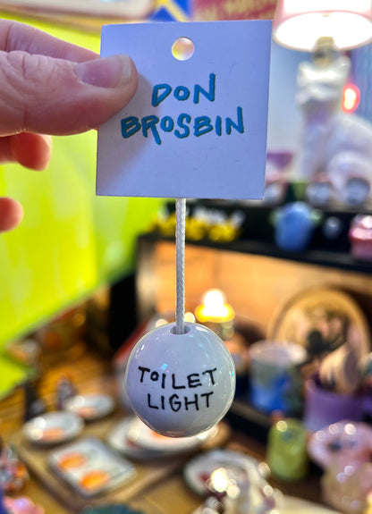 Ceramic Bathroom Light Pull by Don Brosbin