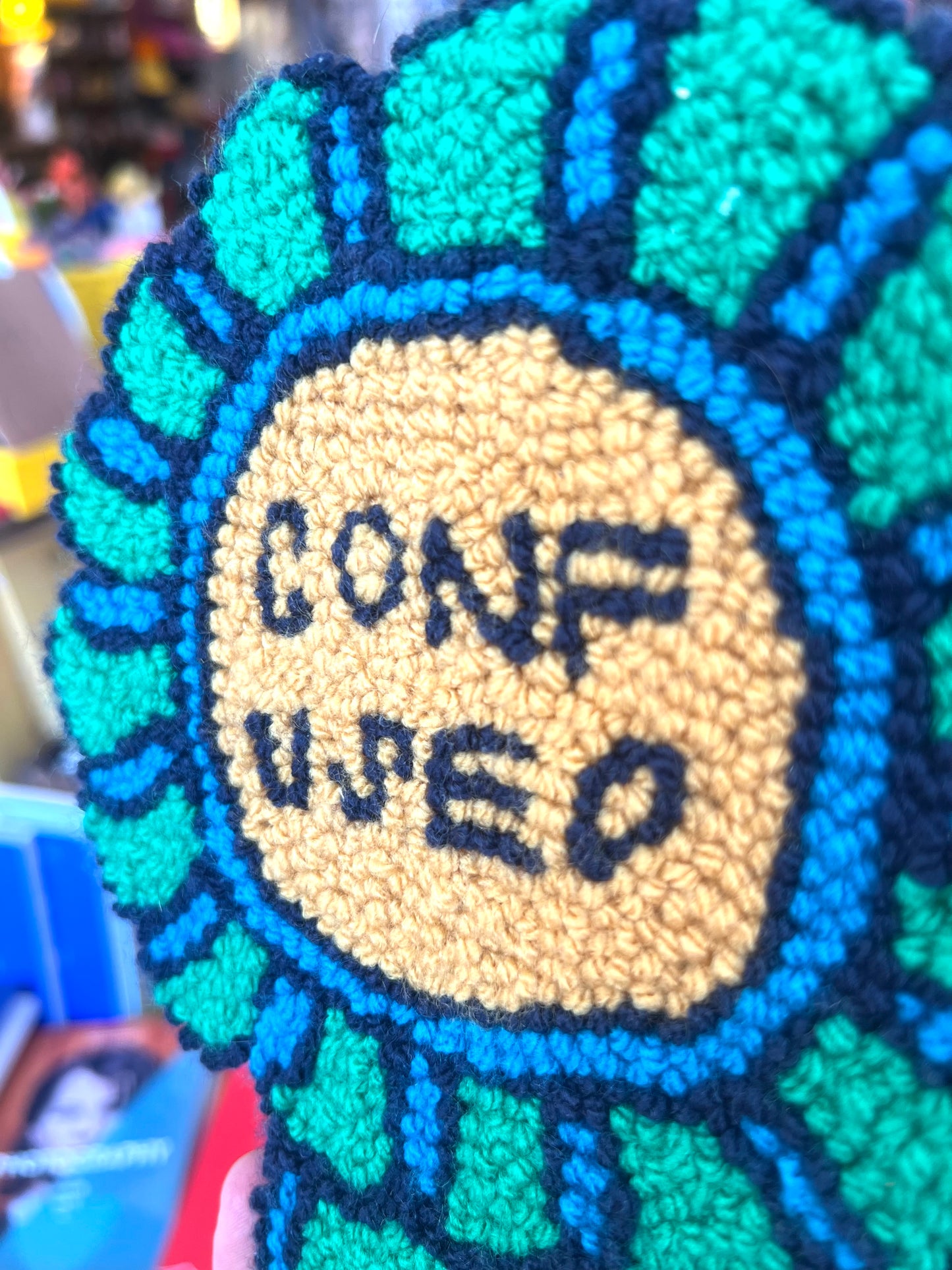 Needle Punched Wall Hanging 'Confused' Badge By Don Brosbin