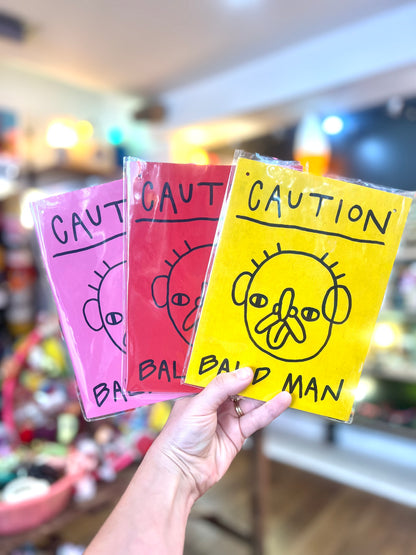 'Caution, Bald Man' Wooden Board Wall Art  by Don Brosbin